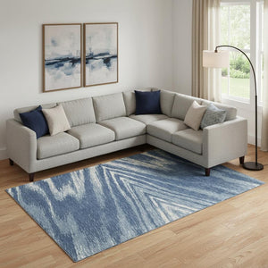 HomeRoots 10' X 14' Washable Blue and Ivory Abstract Area Rug with Stain Resistance and UV Protection Features 669684