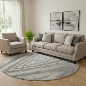 HomeRoots 8' Gray And Ivory Abstract Round Rug - Washable, UV-Protected, Stylish for High-Traffic Areas 669699