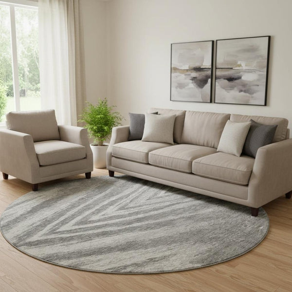 HomeRoots 8' Gray And Ivory Abstract Round Rug - Washable, UV-Protected, Stylish for High-Traffic Areas 669699