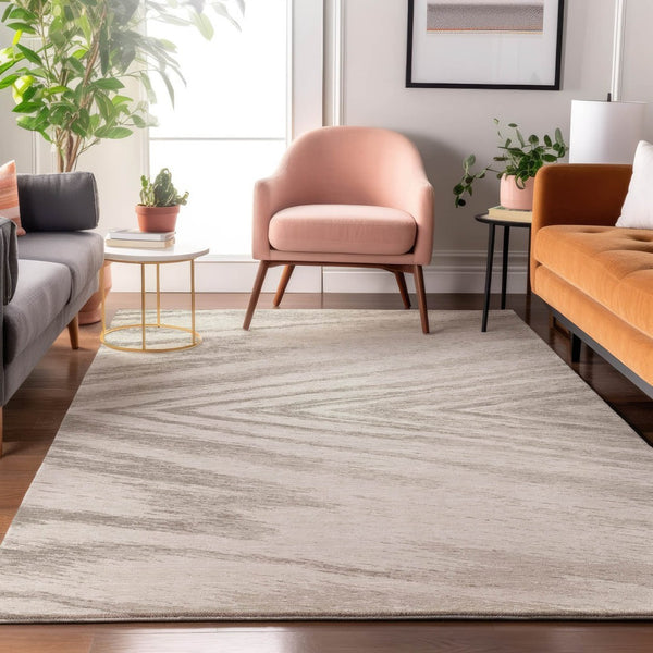 HomeRoots 10' X 14' Abstract Ivory and Beige Washable Area Rug with UV Protection for Modern Living Spaces 669708