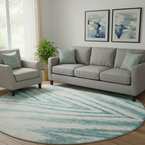 HomeRoots 8' Teal and Ivory Abstract Round Rug - Stylish, Washable, UV-Protected for Homes with Kids & Pets 669741
