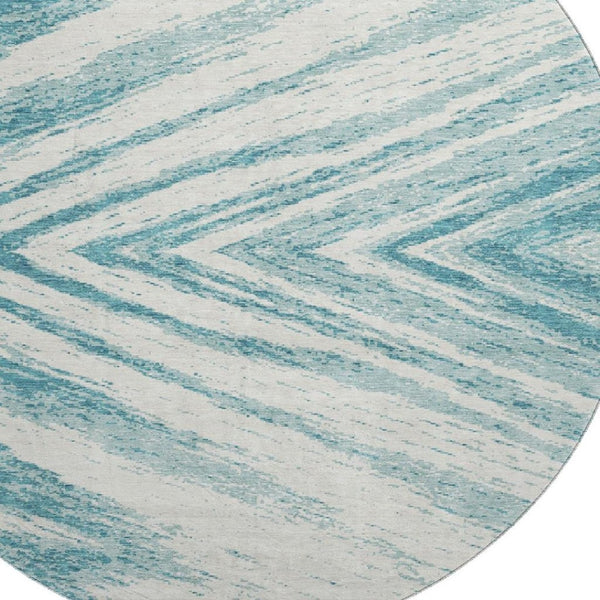 HomeRoots 8' Teal and Ivory Abstract Round Rug - Stylish, Washable, UV-Protected for Homes with Kids & Pets 669741