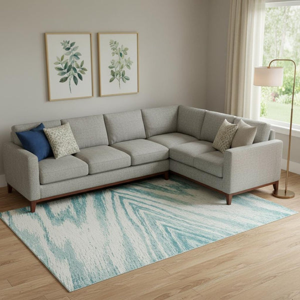 HomeRoots 10' X 14' Teal and Ivory Abstract Area Rug - Durable, UV-Protected, Stain-Resistant for Modern Homes 669744