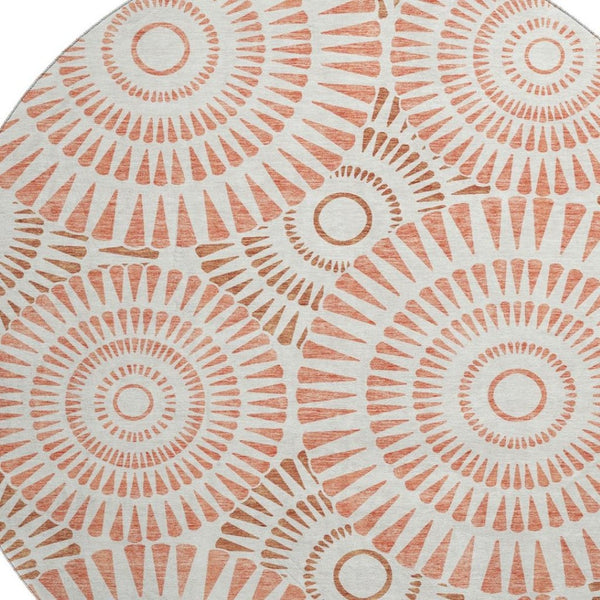 HomeRoots 8' Coral and Ivory Geometric Round Rug - Washable, UV-Protected, Durable Beauty for Any Space 669772