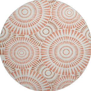 HomeRoots 8' Coral and Ivory Geometric Round Rug - Washable, UV-Protected, Durable Beauty for Any Space 669772