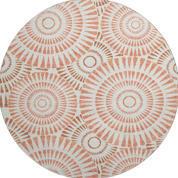 HomeRoots 8' Coral and Ivory Geometric Round Rug - Washable, UV-Protected, Durable Beauty for Any Space 669772