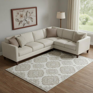 HomeRoots 9' X 12' Ivory And Beige Medallion Area Rug - Washable, UV-Protected, Perfect for High-Traffic Spaces 669864