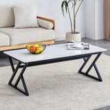 English Elm A Coffee Table Made Of Rock Slab Material, With A Smooth and Natural Surface That Complements The Modern Design Of The Black Metal Legs, Making It Suitable For Living Rooms Of All Sizes.47*23.6