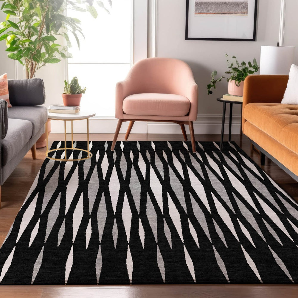 HomeRoots 10' X 14' Geometric Area Rug in Black, Ivory, and Gray – Washable, UV-Protected, Stain-Resistant Design 670027