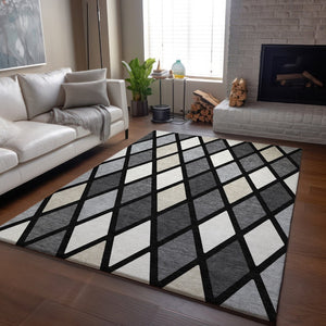 HomeRoots 5' X 8' Stylish Black, Ivory & Gray Geometric Washable Area Rug with UV Protection for Modern Spaces 670455
