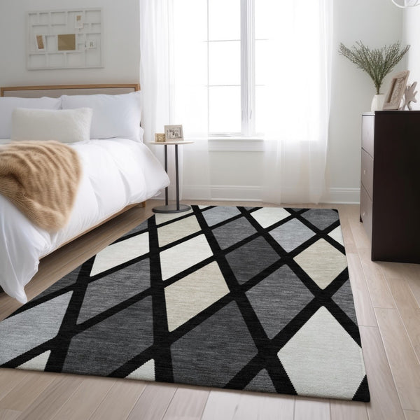 HomeRoots 9' X 12' Black Ivory and Gray Geometric Rug - Washable, Stain-Resistant, UV Protected for Active Homes 670458