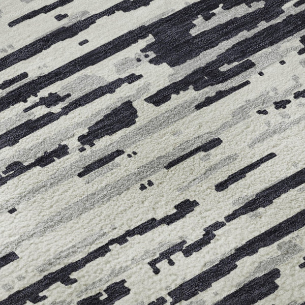HomeRoots 8' Washable Black and Ivory Striped Round Rug with UV Protection for Stylish High-Traffic Spaces 670528