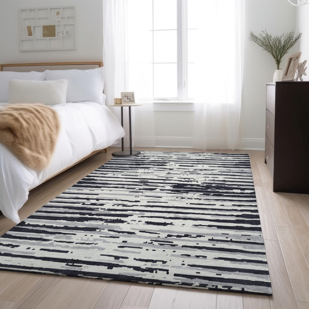 HomeRoots 8' X 10' Black And Ivory Striped Washable Area Rug – Durable, Stylish, UV-Protected for Busy Homes 670529
