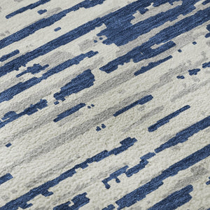 HomeRoots 8' Navy Blue Striped Round Rug – Washable, UV-Protected, Stylish & Stain-Resistant for Any Space 670570