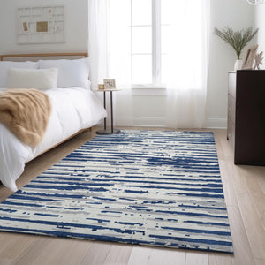 HomeRoots 10' Navy Blue and Ivory Striped Area Rug - Washable, UV Protected, Durable for Indoor & Outdoor Use 670573