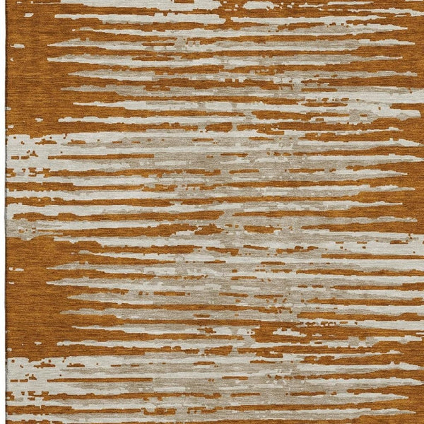 HomeRoots 10' X 14' Washable Rust & Ivory Striped Area Rug with UV Protection for Family-Friendly Spaces 670579