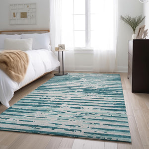 HomeRoots 9' X 12' Teal And Ivory Striped Area Rug - Washable, UV Protected, Stylish for High-Traffic Spaces 670602