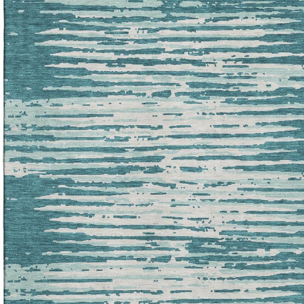 HomeRoots 9' X 12' Teal And Ivory Striped Area Rug - Washable, UV Protected, Stylish for High-Traffic Spaces 670602