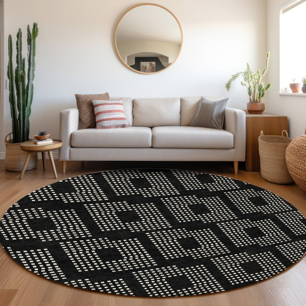 HomeRoots 8' Black And Ivory Geometric Round Rug - Washable, UV Protected, Durable for High-Traffic Areas 670685