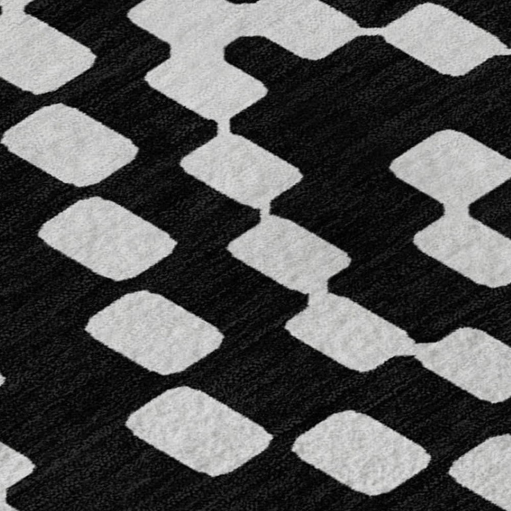 HomeRoots 5' X 8' Stylish Black & Ivory Geometric Area Rug - Washable, UV-Protected, Perfect for High-Traffic Spaces 670780