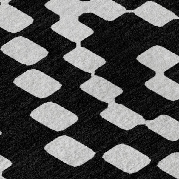 HomeRoots 5' X 8' Stylish Black & Ivory Geometric Area Rug - Washable, UV-Protected, Perfect for High-Traffic Spaces 670780