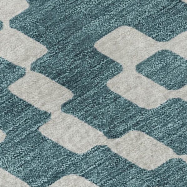 HomeRoots 5' X 8' Stylish Teal and Ivory Geometric Washable Area Rug with UV Protection for High-Traffic Areas 670840