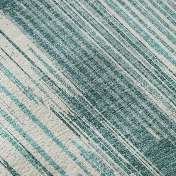 HomeRoots 8' Teal and Ivory Striped Washable Round Rug - Stain Resistant, UV Protected, Perfect for High-Traffic Areas 671045