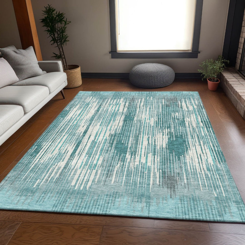 HomeRoots 9' X 12' Teal and Ivory Striped Area Rug – Washable, UV Resistant, Durable for High-Traffic Spaces 671047