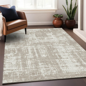 HomeRoots 9' X 12' Taupe And Beige Abstract Area Rug - Washable, UV Protected, Stylish & Durable for Any Room 671185