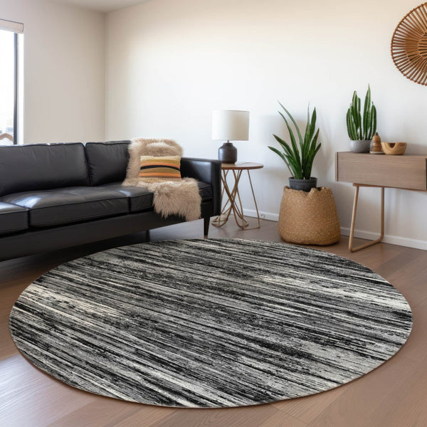 HomeRoots 8' Black and Ivory Striped Washable Round Rug - Durable, Stylish, and UV-Resistant for Every Space 671195