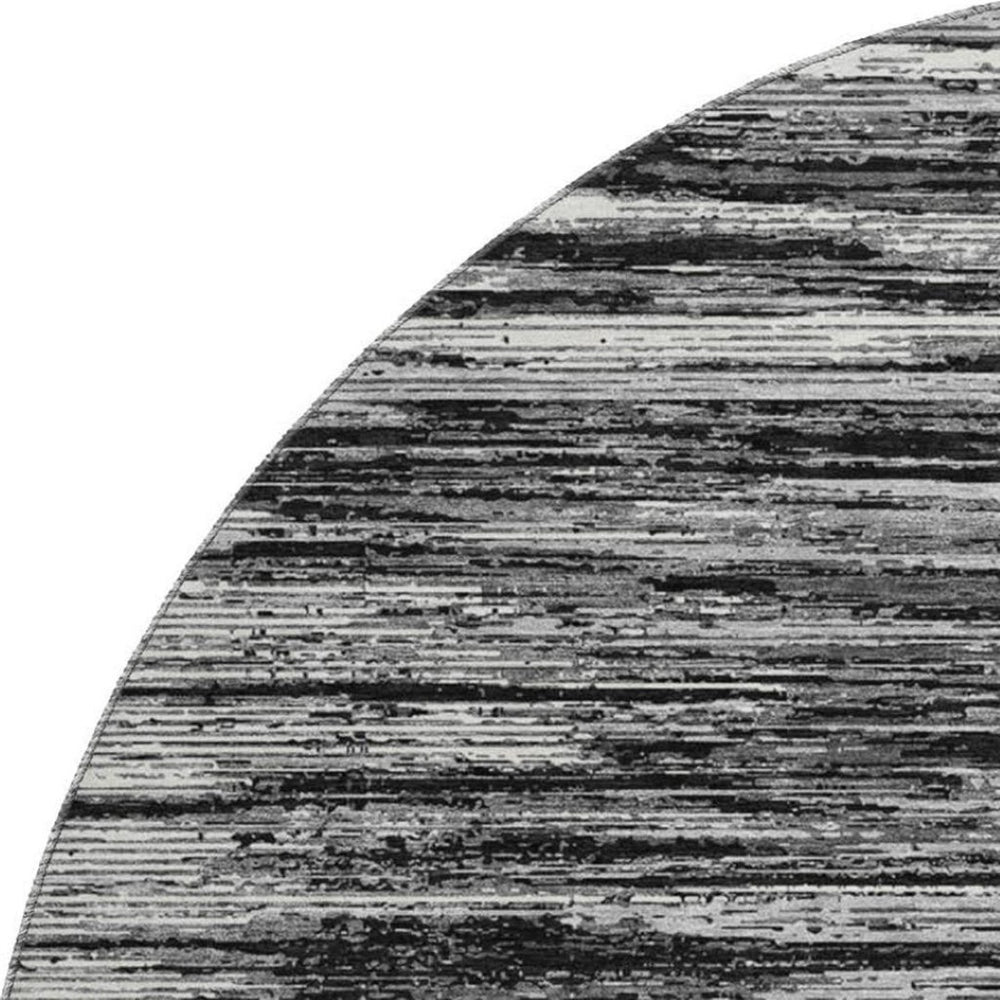 HomeRoots 8' Black and Ivory Striped Washable Round Rug - Durable, Stylish, and UV-Resistant for Every Space 671195