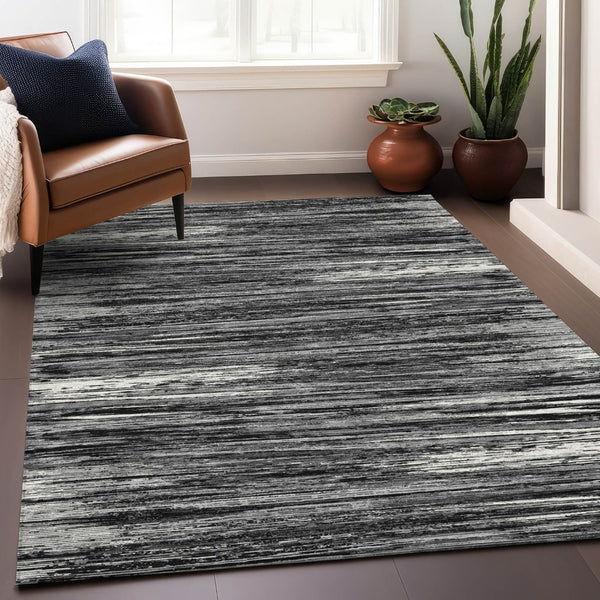 HomeRoots 10' Black and Ivory Striped Area Rug - Washable, UV Protected, Durable Design for High-Traffic Spaces 671198