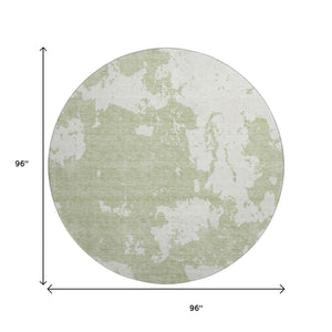 HomeRoots 8' Artichoke Green and Ivory Abstract Round Rug - Washable, UV-Protected, Stain-Resistant Design! 671261