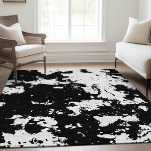 HomeRoots 10' X 14' Black And White Abstract Area Rug - Washable, Durable, UV Protected for Modern Living Spaces 671276