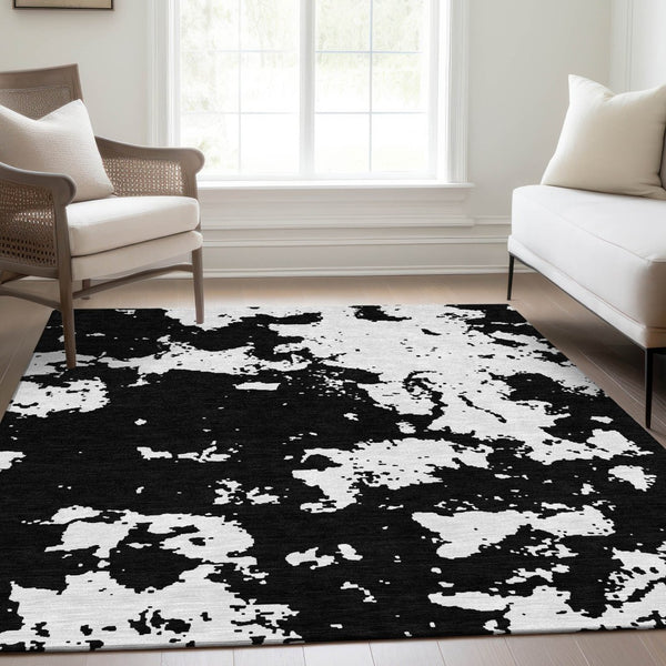 HomeRoots 10' X 14' Black And White Abstract Area Rug - Washable, Durable, UV Protected for Modern Living Spaces 671276