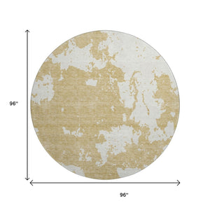 HomeRoots 8' Gold and Beige Abstract Washable Round Rug - Durable, UV-Protected, Ideal for Modern Living Spaces 671285