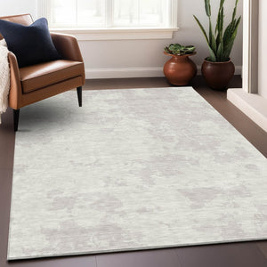 HomeRoots 8' X 10' Ivory and Beige Abstract Washable Area Rug - Stylish UV Protected Design for Modern Spaces 671304