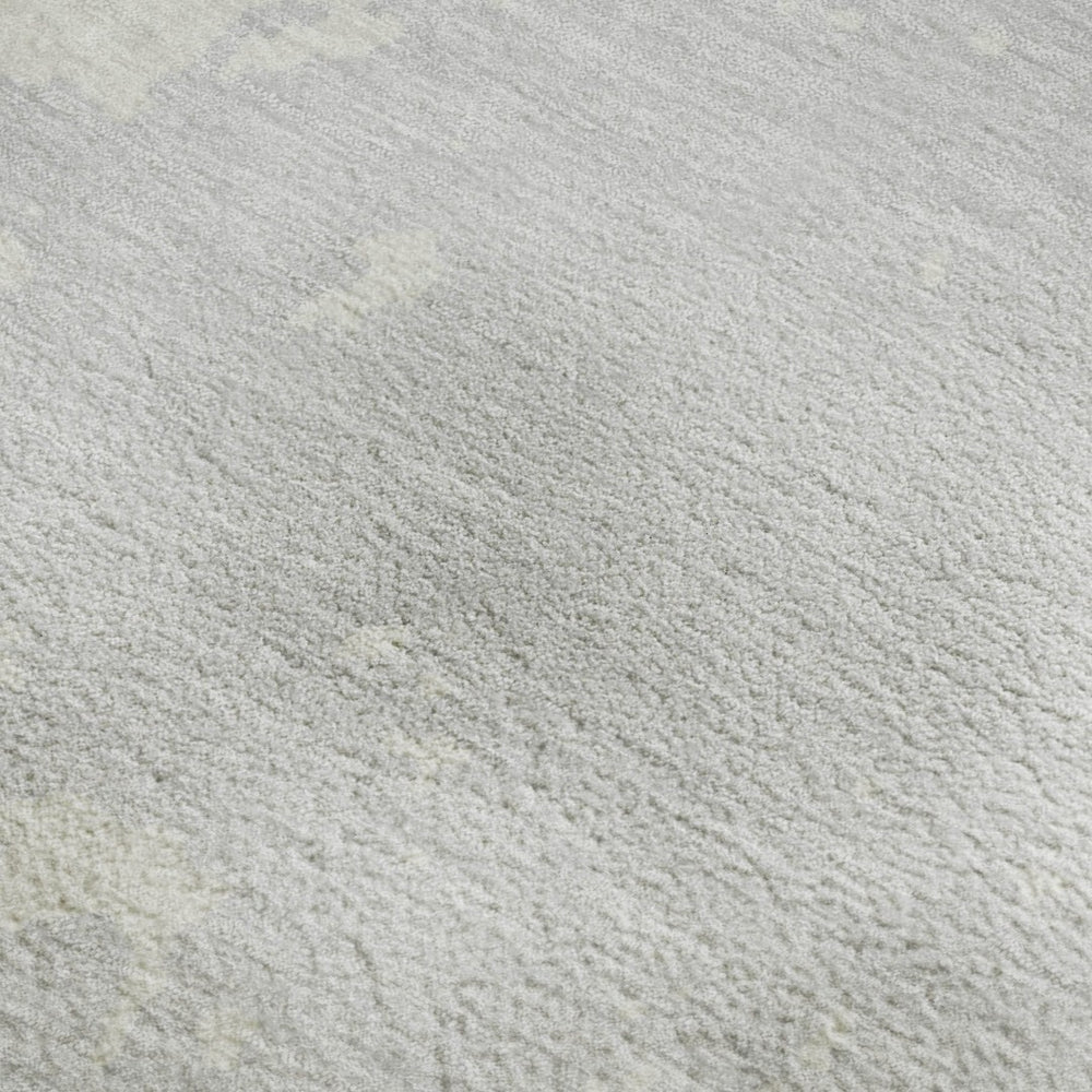 HomeRoots 9' X 12' Silver and Ivory Abstract Area Rug - Durable, Washable, UV-Protected for Modern Living Spaces 671329