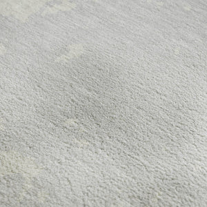 HomeRoots 9' X 12' Silver and Ivory Abstract Area Rug - Durable, Washable, UV-Protected for Modern Living Spaces 671329