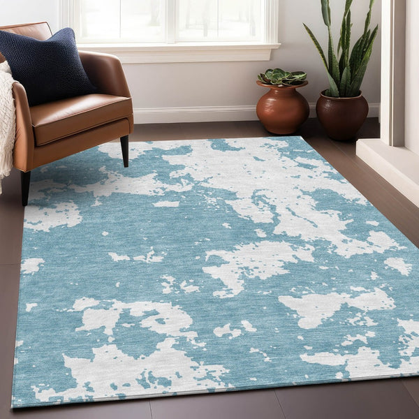 HomeRoots 10' Sky Blue & Ivory Abstract Washable Area Rug - Durable, UV-Protected, Perfect for Modern Spaces! 671336