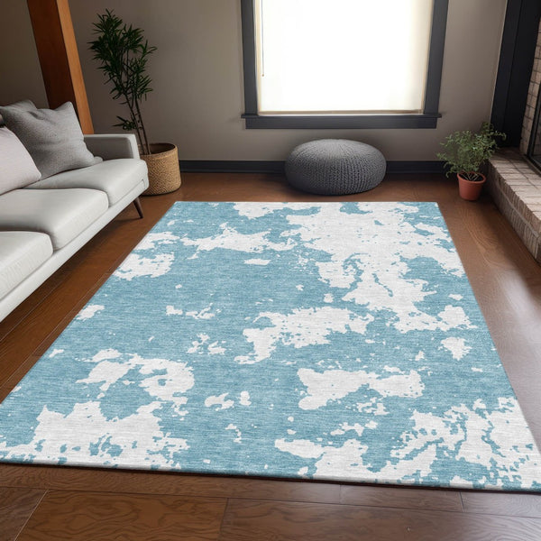 HomeRoots 10' Sky Blue & Ivory Abstract Washable Area Rug - Durable, UV-Protected, Perfect for Modern Spaces! 671336