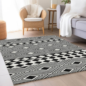 HomeRoots 5' X 8' Black And Ivory Geometric Area Rug – Washable, UV Protected, Durable, Modern Design for Any Space 671356