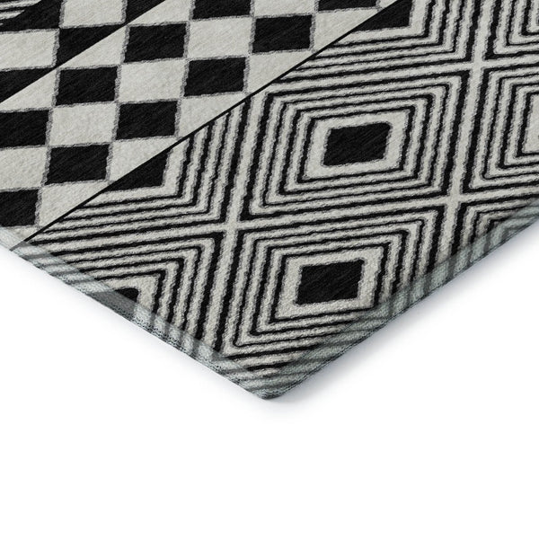 HomeRoots 5' X 8' Black And Ivory Geometric Area Rug – Washable, UV Protected, Durable, Modern Design for Any Space 671356