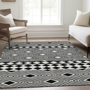 HomeRoots 8' X 10' Black & Ivory Geometric Washable Area Rug with UV Protection – Durable, Stylish, Ideal for Homes 671358