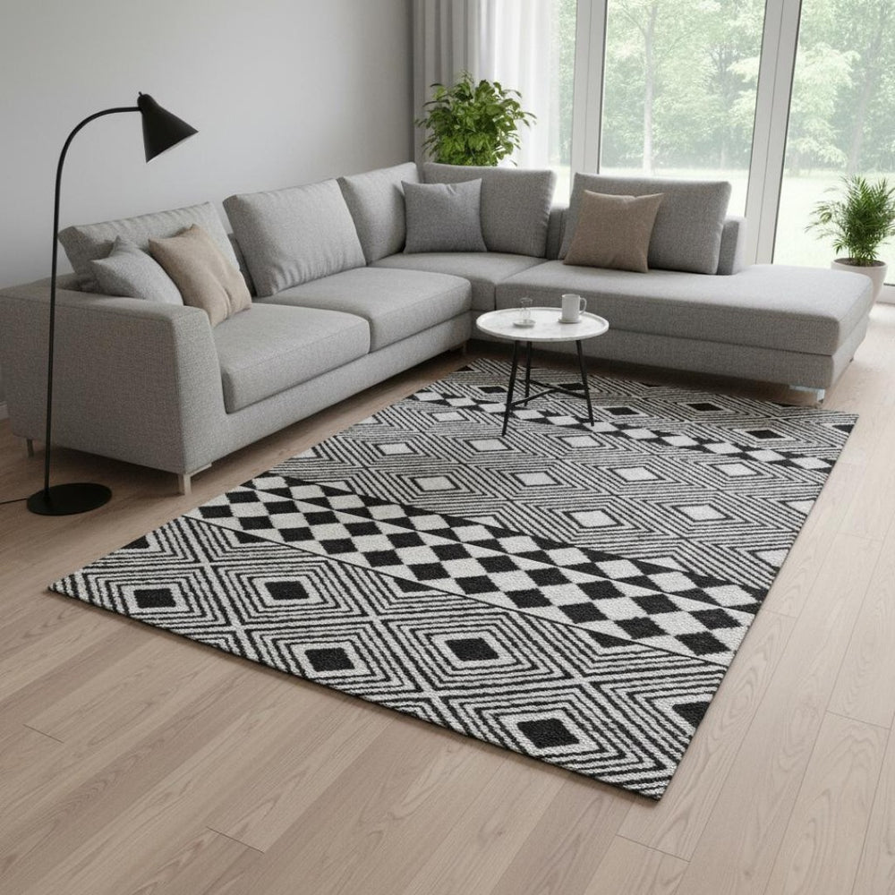 HomeRoots 10' X 14' Black And Ivory Geometric Area Rug – Washable, UV-Protected, Stylish & Durable Design 671360