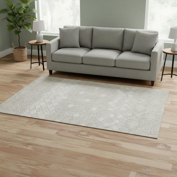 HomeRoots 5' X 8' Ivory and Beige Geometric Area Rug - Washable, UV Protected, Stain-Resistant for High Traffic 671386
