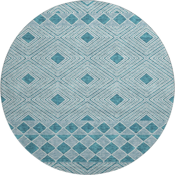 HomeRoots 8' Teal and Ivory Geometric Round Rug - Washable, UV-Protected, and Ideal for Busy Homes! 671411