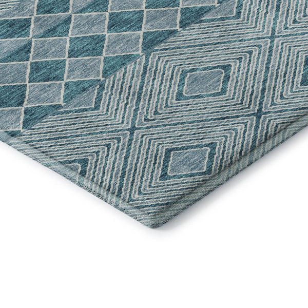 HomeRoots 8' Teal and Ivory Geometric Round Rug - Washable, UV-Protected, and Ideal for Busy Homes! 671411
