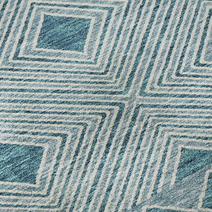 HomeRoots 8' Teal and Ivory Geometric Round Rug - Washable, UV-Protected, and Ideal for Busy Homes! 671411
