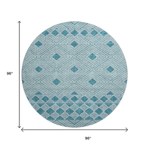 HomeRoots 8' Teal and Ivory Geometric Round Rug - Washable, UV-Protected, and Ideal for Busy Homes! 671411